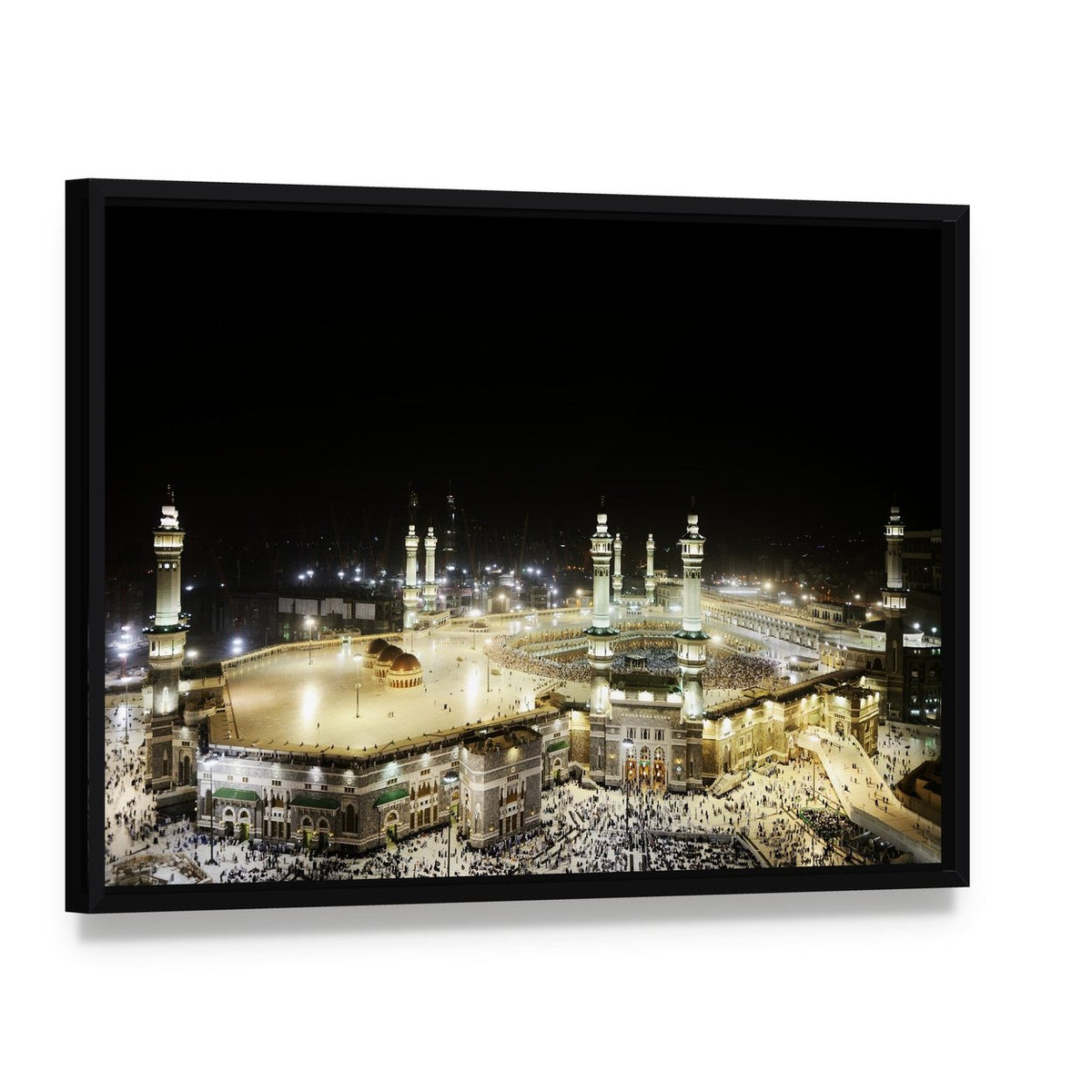 Illuminated Kaaba at Night Canvas Wall Art, framed canvas in a black floater frame, angled product view