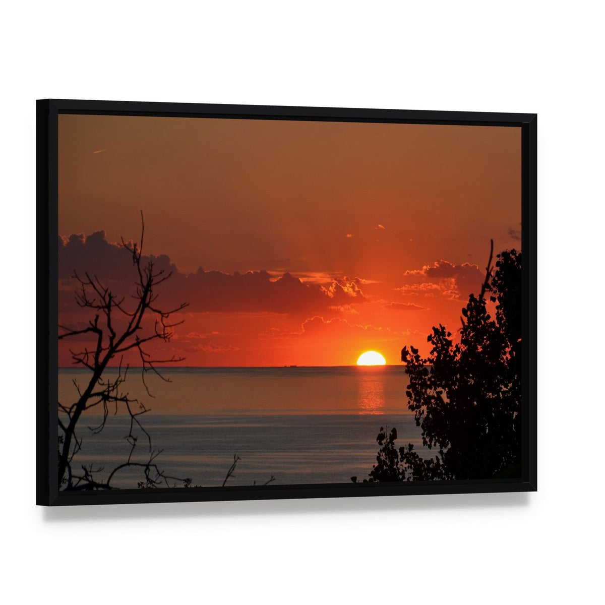 Sunset Over Lake Michigan Canvas Wall Art, framed canvas in a black floater frame, angled product view