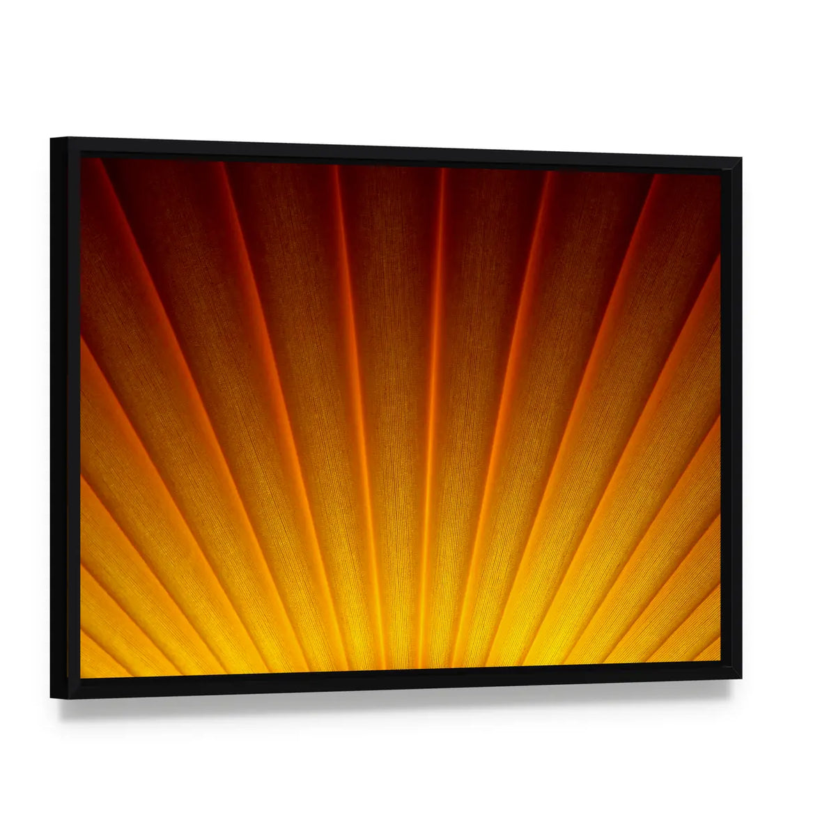 Golden Sunburst Abstract Canvas Wall Art, framed canvas in a black floater frame, angled product view