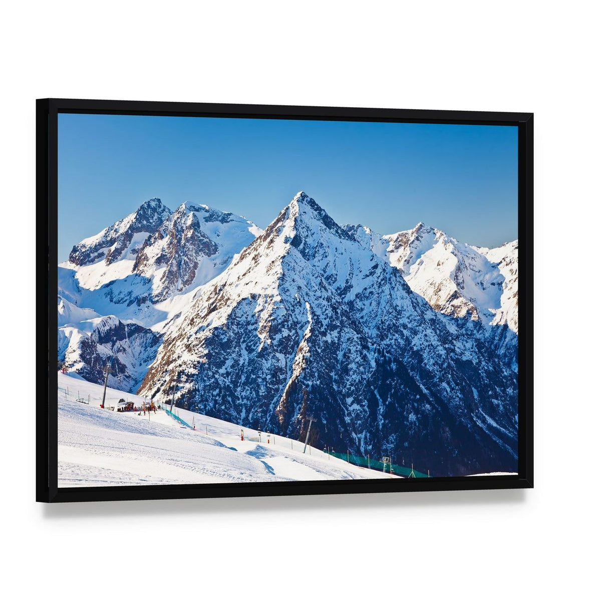 Ski Resort and French Alps Canvas Wall Art, framed canvas in a black floater frame, angled product view
