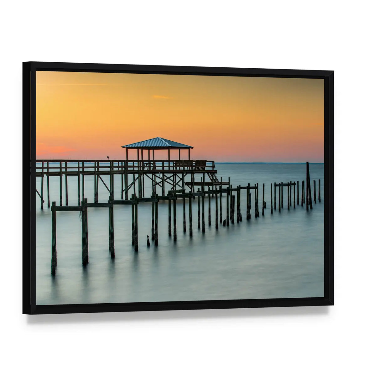 Fairhope Pier at Sunset Canvas Wall Art, framed canvas in a black floater frame, angled product view