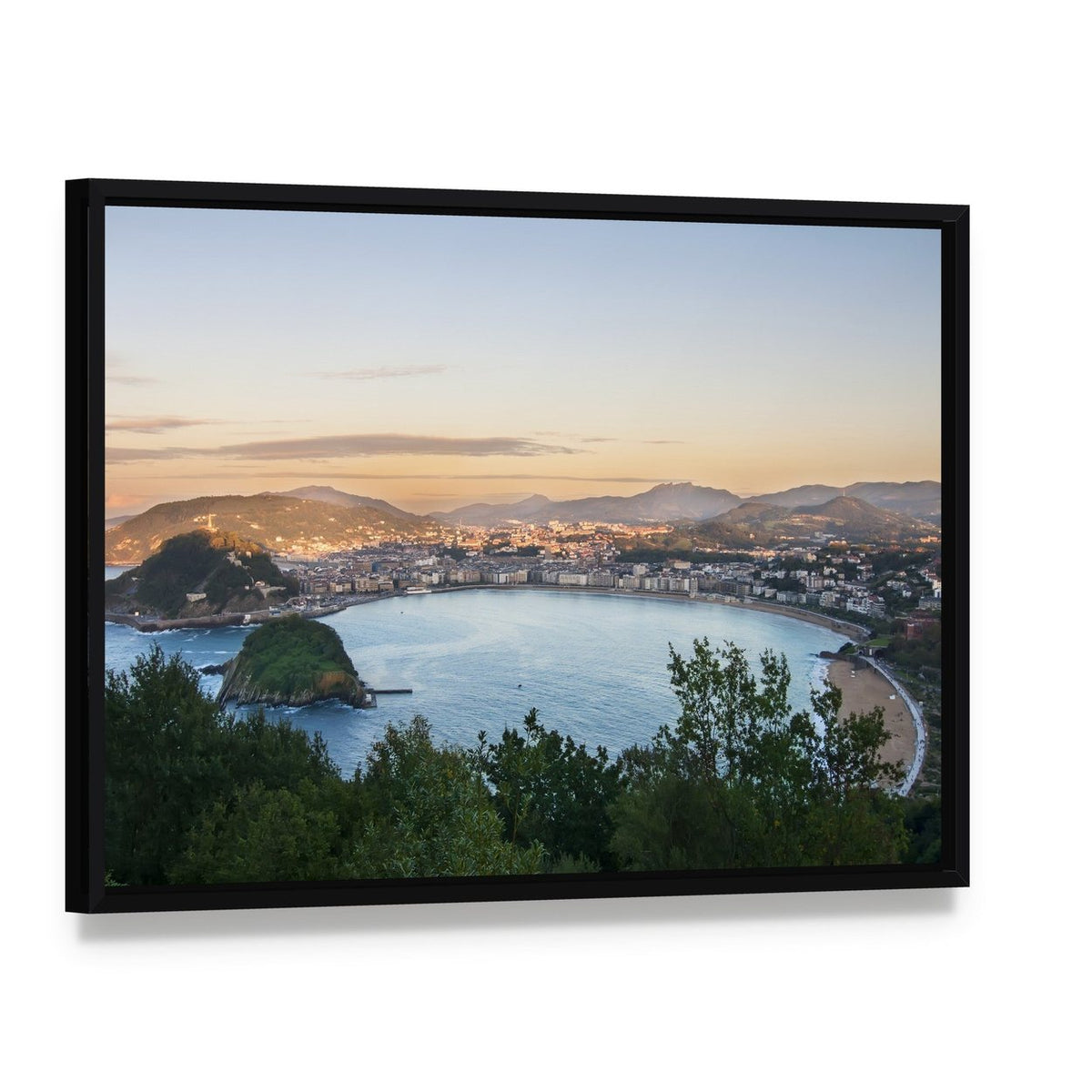 Bay of San Sebastian Canvas Wall Art, framed canvas in a black floater frame, angled product view