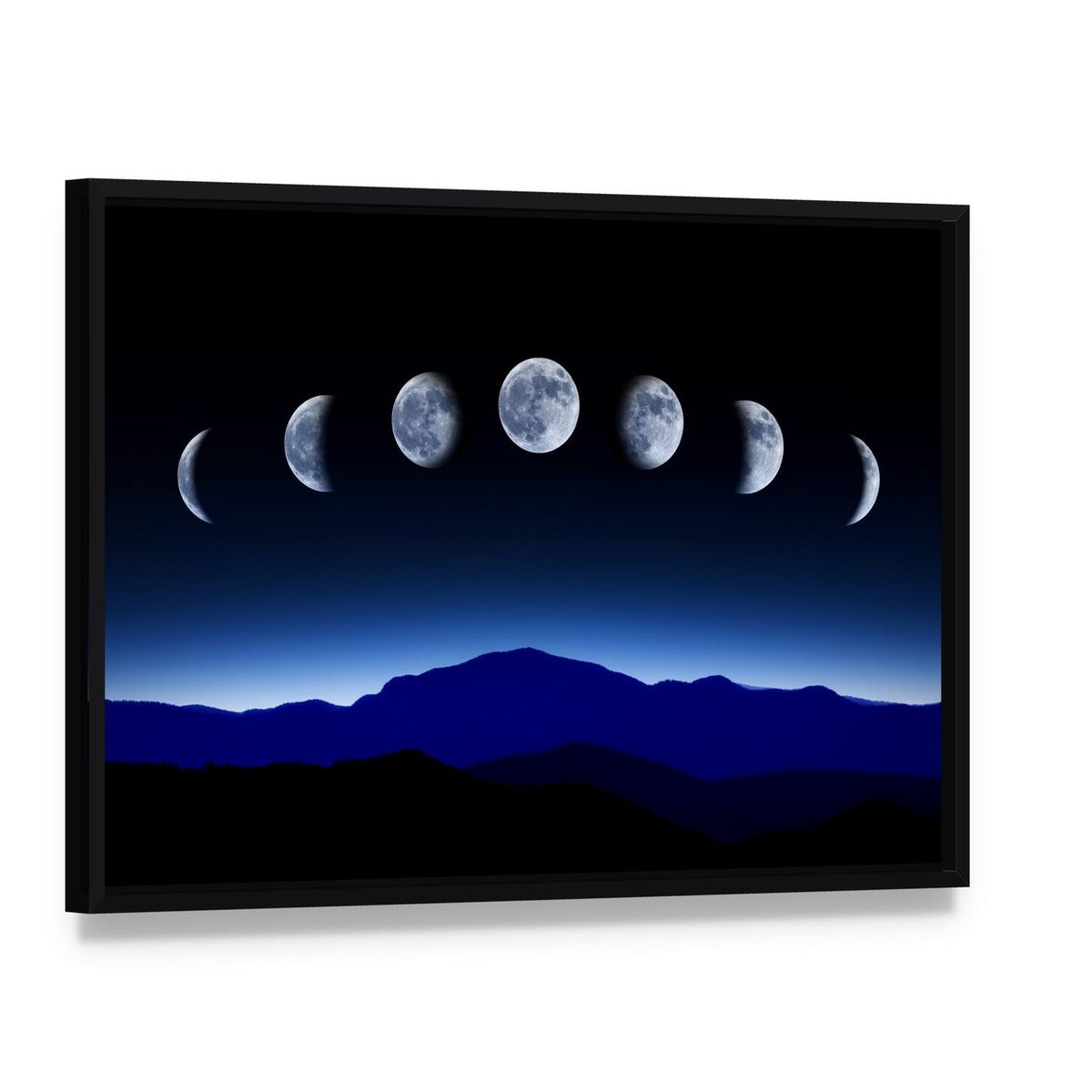 Moon Lunar Cycle Canvas Wall Art, framed canvas in a black floater frame, angled product view