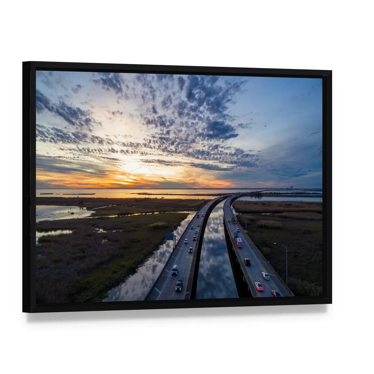 Sunset Over Highway Bridge Canvas Wall Art, framed canvas in a black floater frame, angled product view