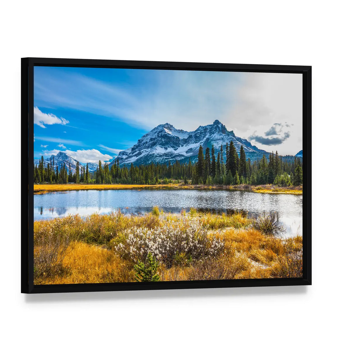 Snowy Rocky Mountains Lake Reflection Canvas Wall Art, framed canvas in a black floater frame, angled product view