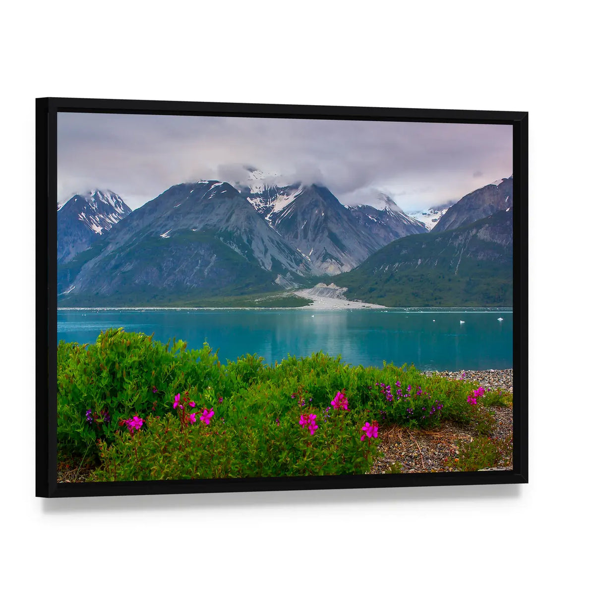 Glacier Bay Wildflowers and Snow-capped Mountains Canvas Wall Art, framed canvas in a black floater frame, angled product view