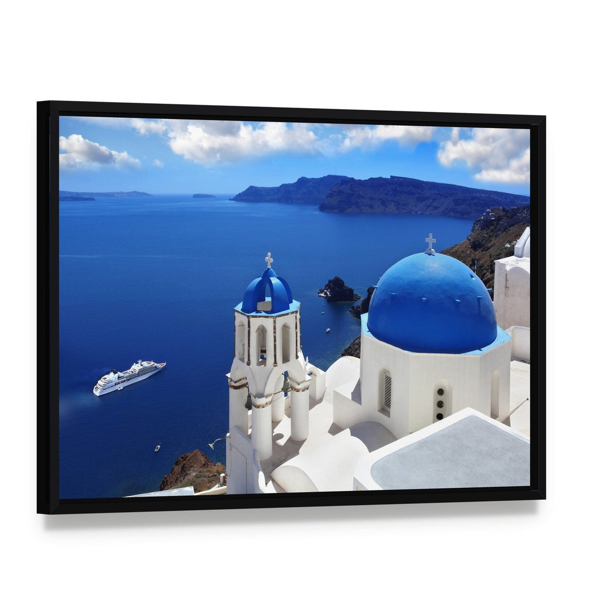 Santorini Island with Blue Domed Church Canvas Wall Art, framed canvas in a black floater frame, angled product view
