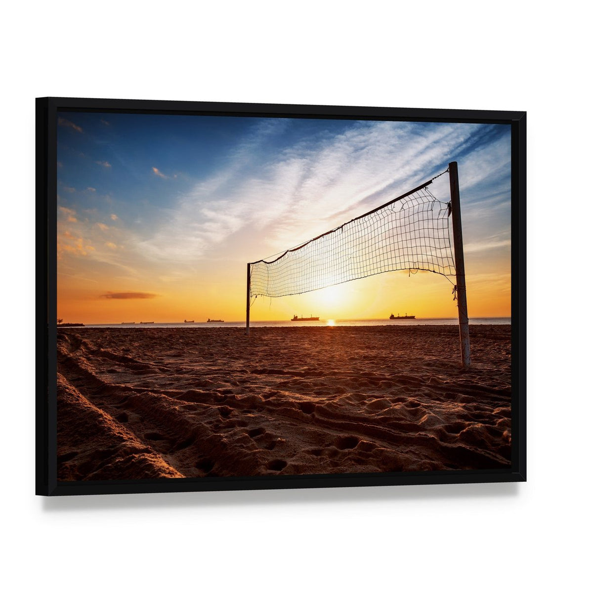 Silhouette of a Volleyball Net and Sunrise on the Beach Canvas Wall Art, framed canvas in a black floater frame, angled product view
