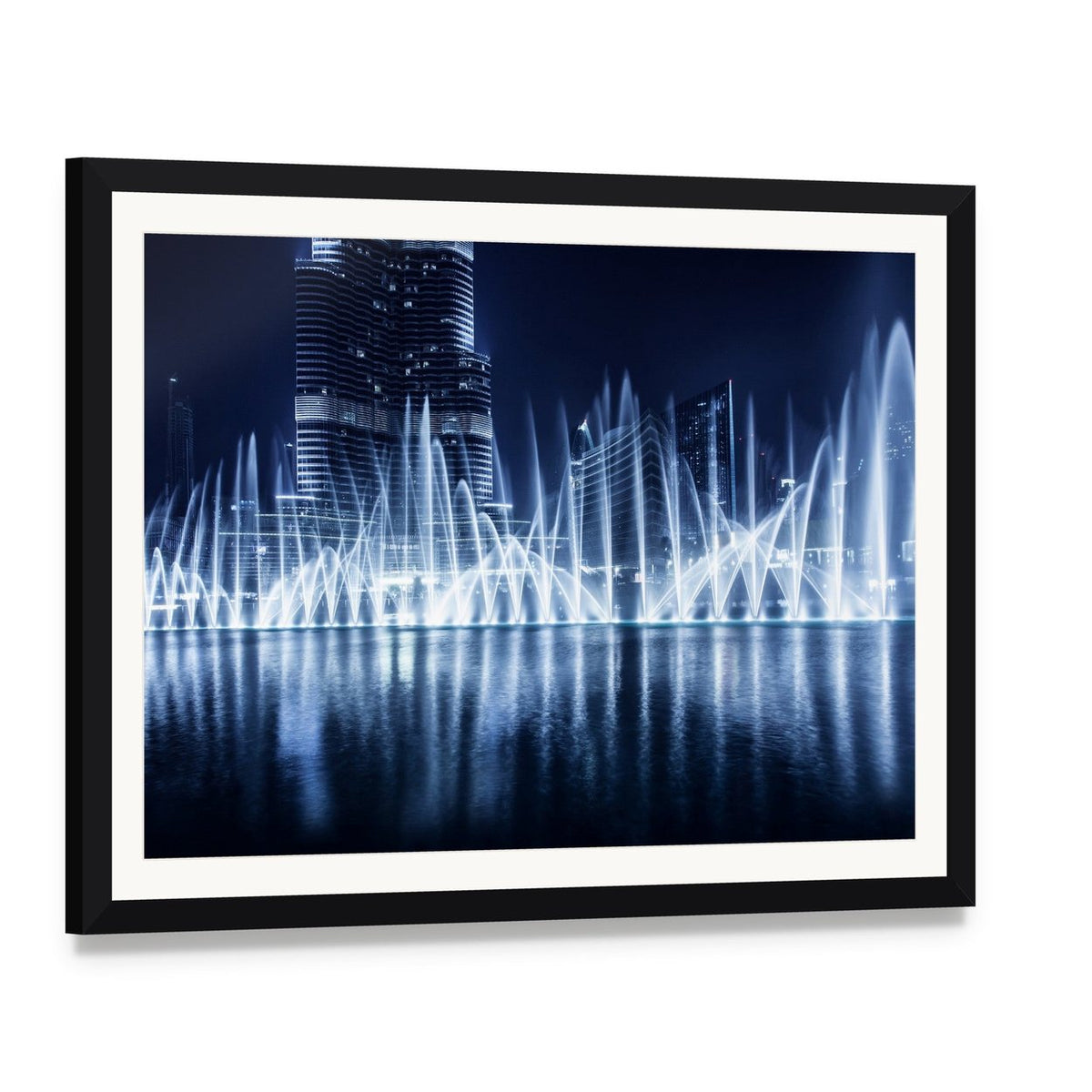 Dancing Fountains Under City Lights Canvas Wall Art, framed print with white mat and black frame, angled product view