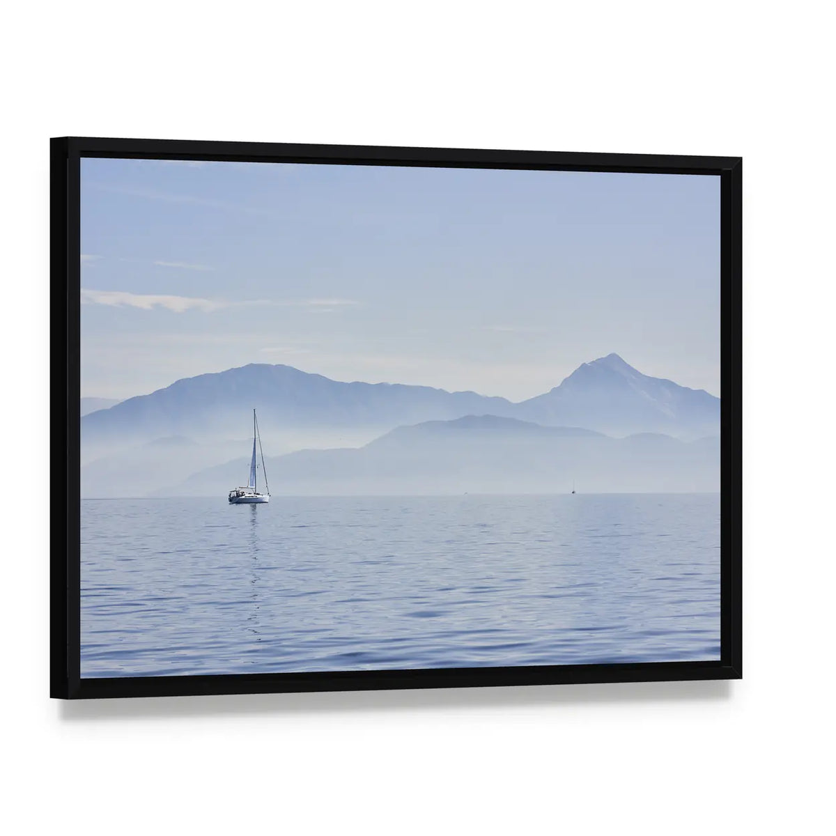 Sailing Boat At Sunrise Canvas Wall Art, framed canvas in a black floater frame, angled product view