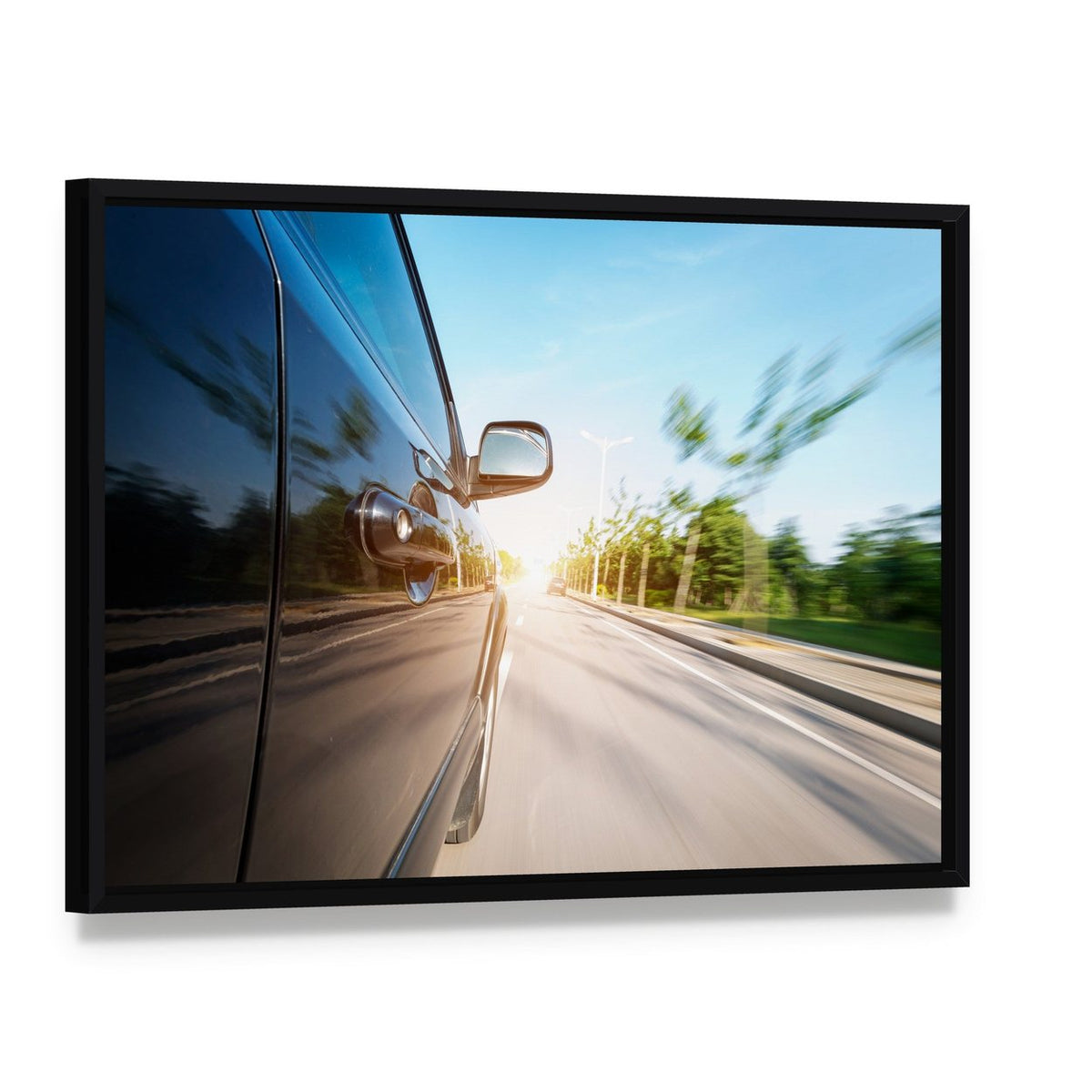 Black Car with Motion Blur Canvas Wall Art, framed canvas in a black floater frame, angled product view