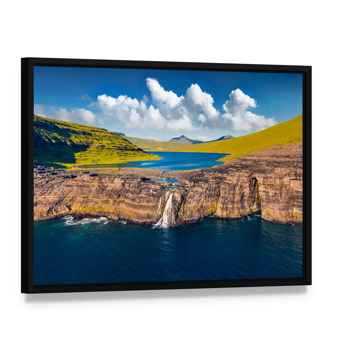 Bosdalafossur Waterfall And Sorvagsvatn Lake In Denmark Canvas Wall Art, framed canvas in a black floater frame, angled product view