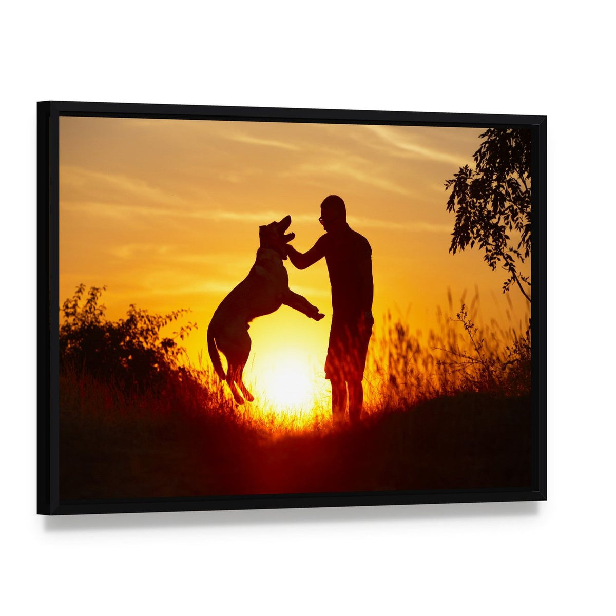 Young Man with Yellow Labrador Retriever Canvas Wall Art, framed canvas in a black floater frame, angled product view