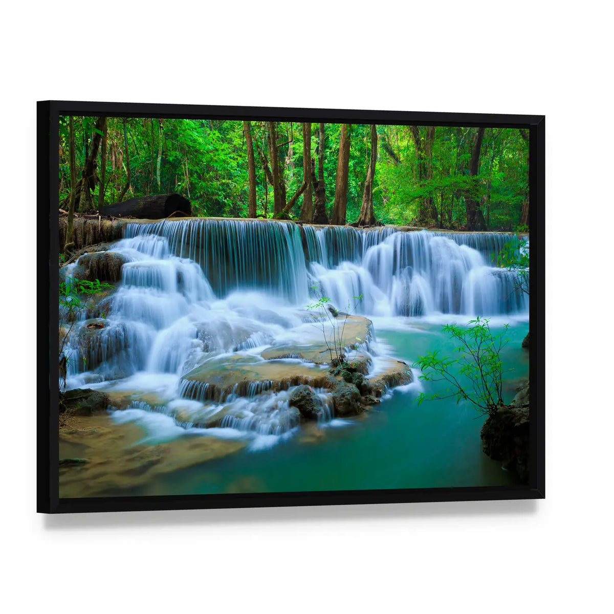 Huay Ma Khamin Waterfall In Kanchanaburi Thailand Canvas Wall Art, framed canvas in a black floater frame, angled product view
