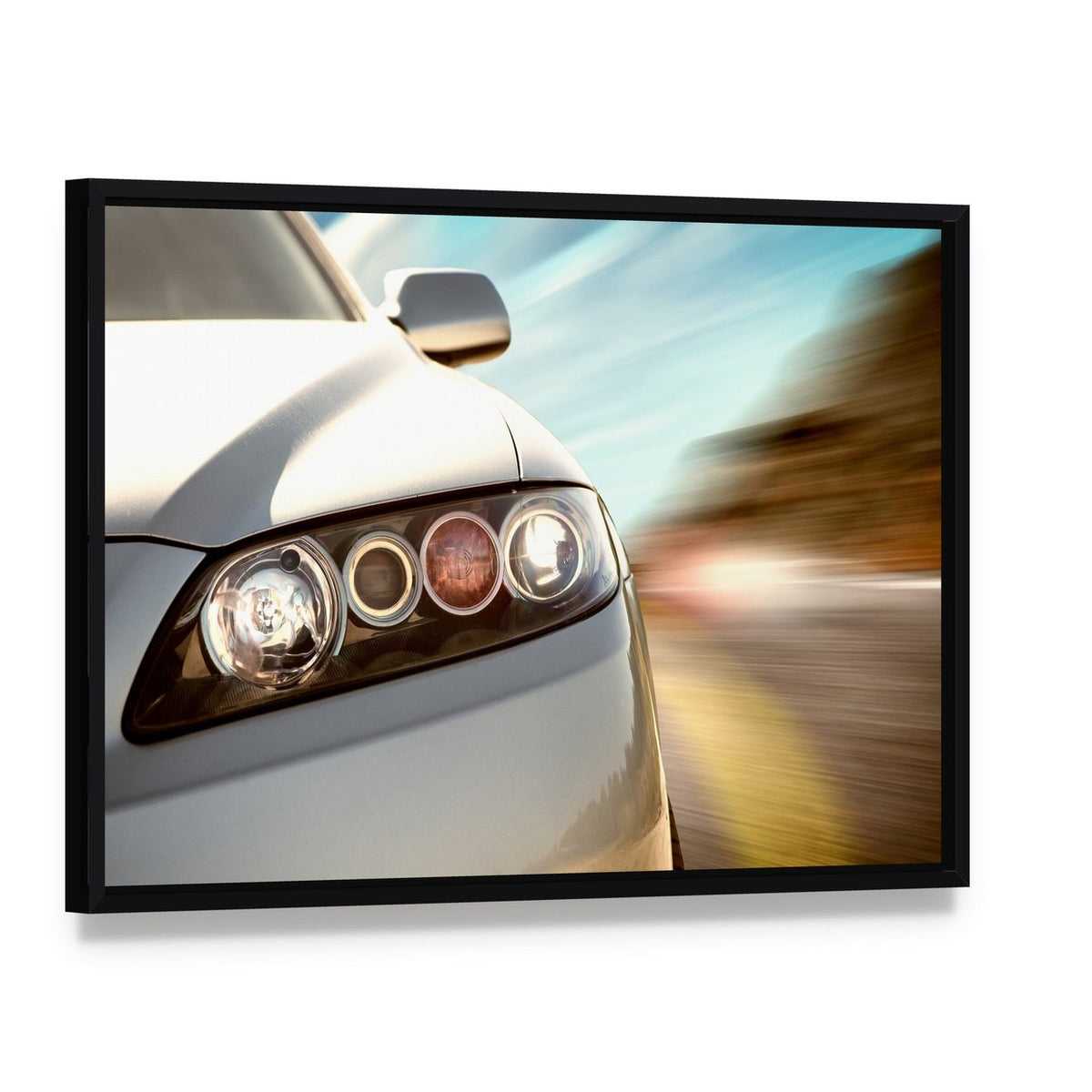 Car Driving on a Motorway at High Speeds Canvas Wall Art, framed canvas in a black floater frame, angled product view