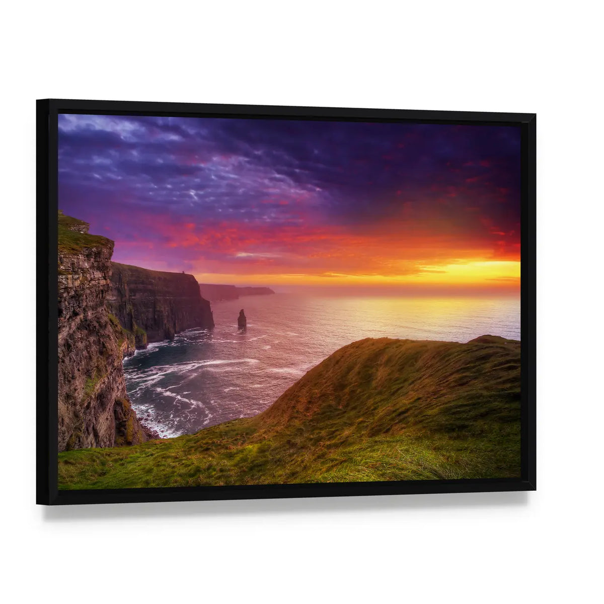 Sunset at the Cliffs of Moher Canvas Wall Art, framed canvas in a black floater frame, angled product view