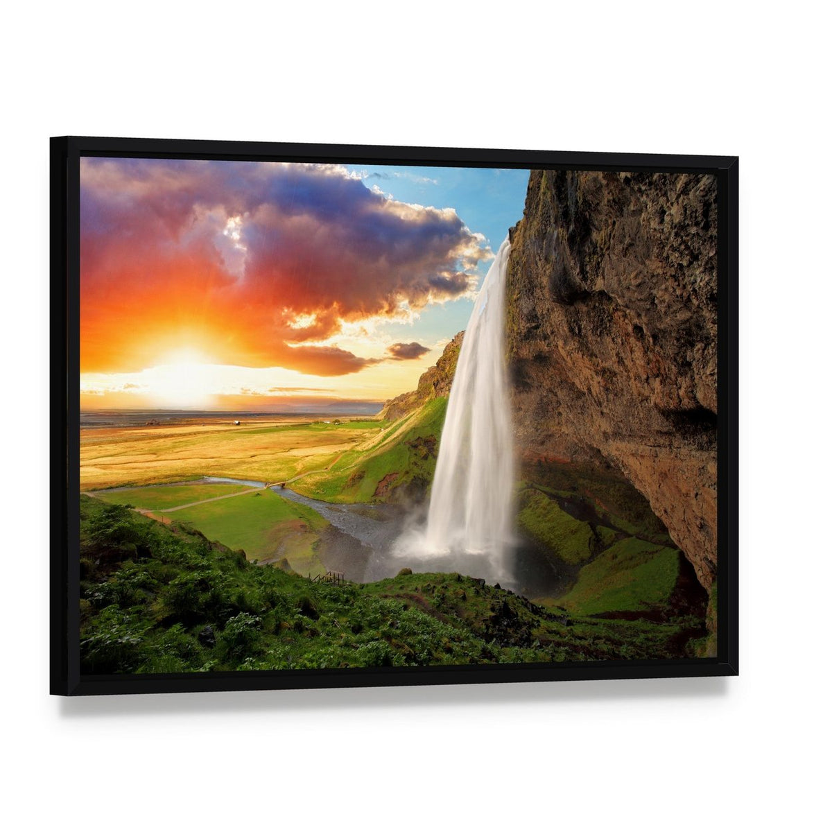 Seljalandsfoss Waterfall Sunset Canvas Wall Art, framed canvas in a black floater frame, angled product view