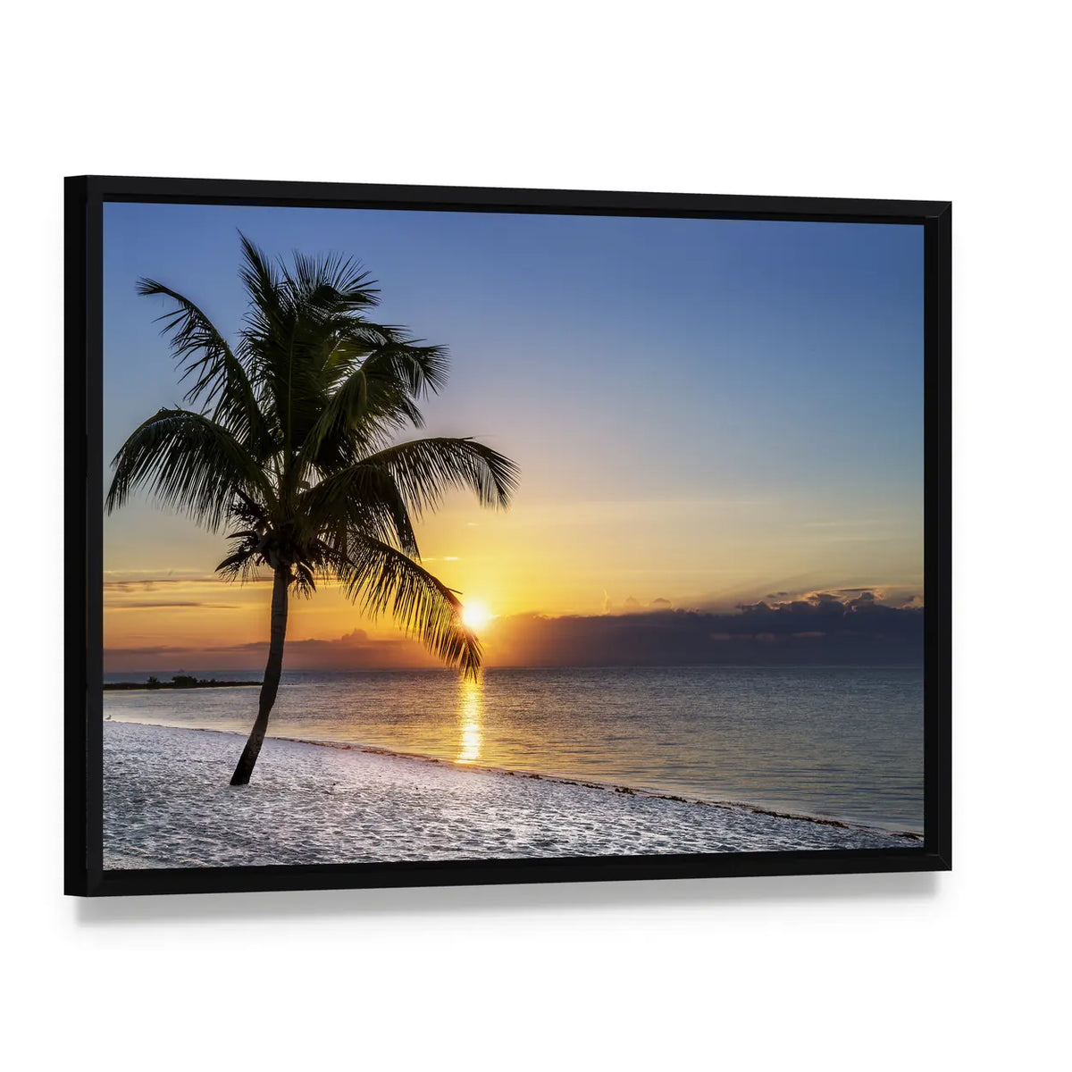 Golden Hour Beach Palm Silhouette Canvas Wall Art, framed canvas in a black floater frame, angled product view