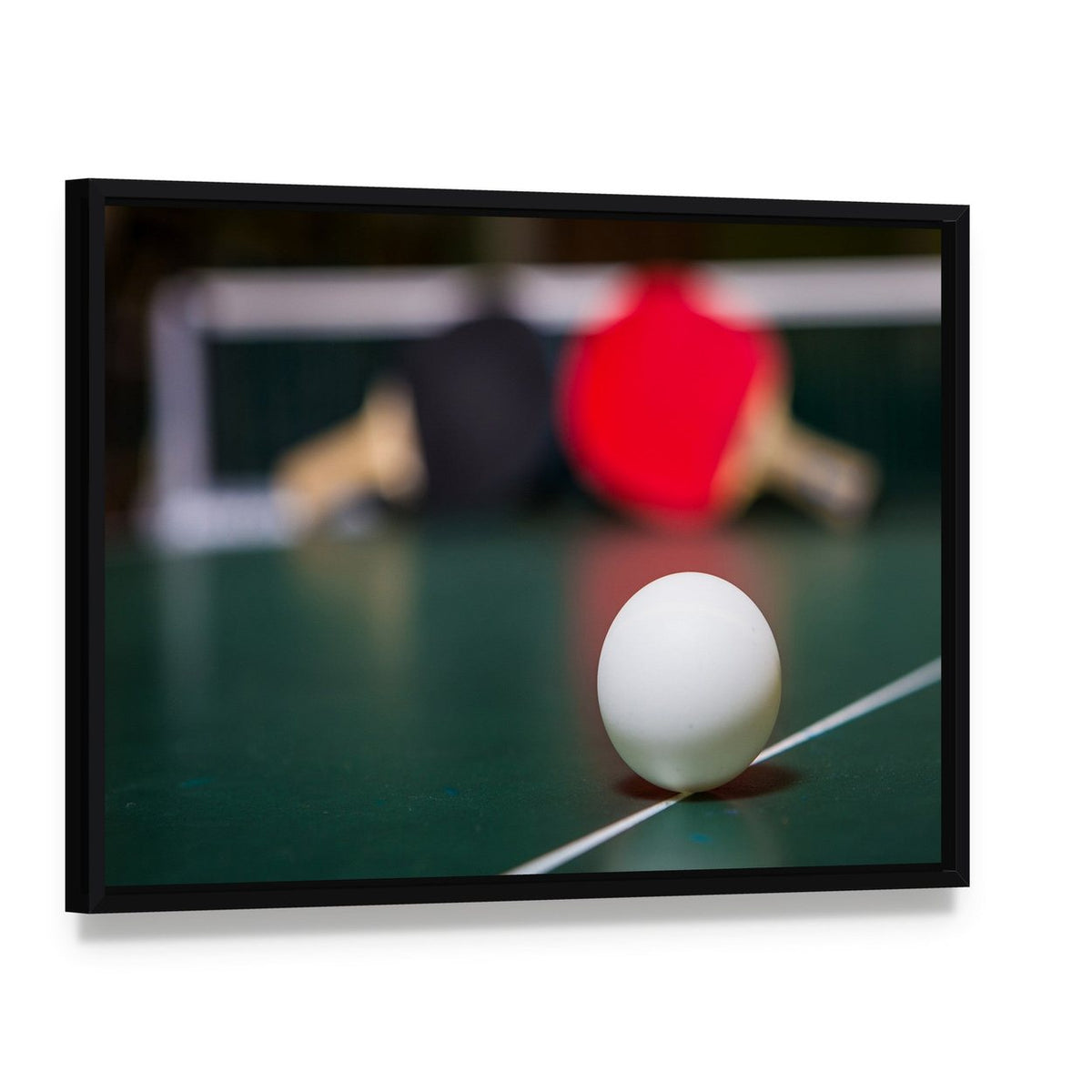 Table Tennis Ball Canvas Wall Art, framed canvas in a black floater frame, angled product view