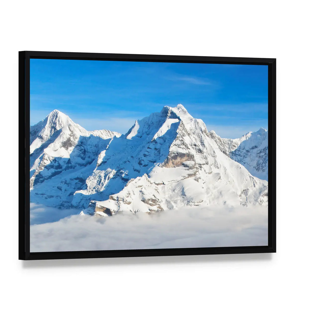 Swiss Alps In Winter Canvas Wall Art, framed canvas in a black floater frame, angled product view