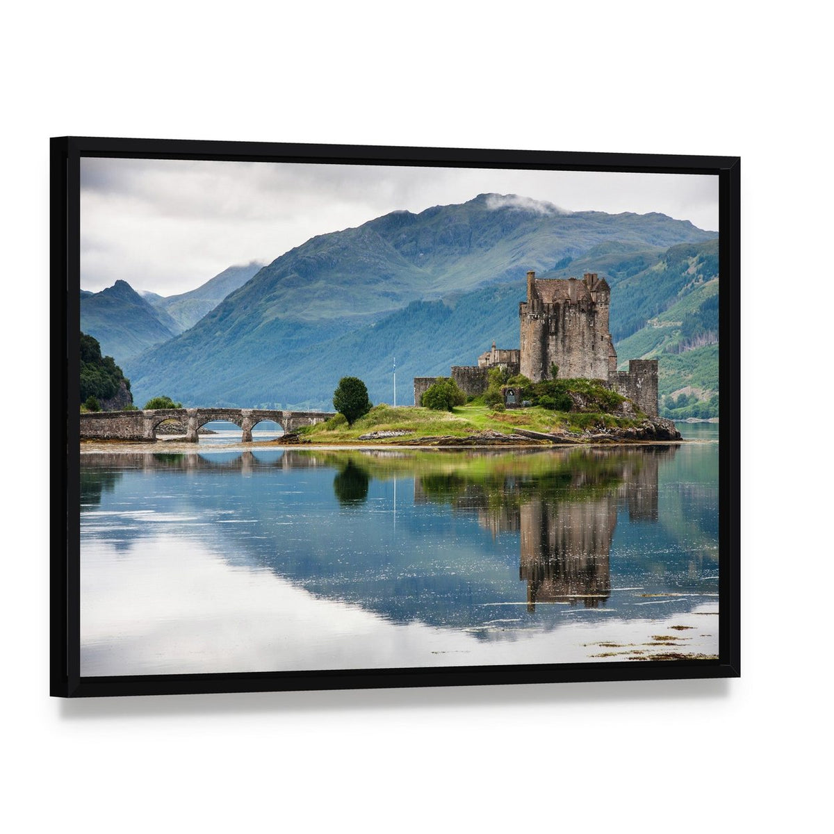 Eilean Donan Castle Canvas Wall Art, framed canvas in a black floater frame, angled product view