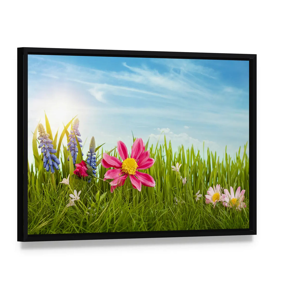 Spring Flowers Under Blue Sky Canvas Wall Art, framed canvas in a black floater frame, angled product view