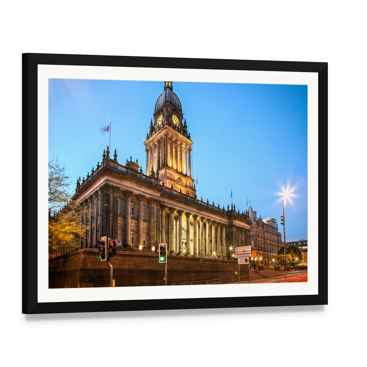Illuminated Leeds Town Hall at Dusk Canvas Wall Art, framed print with white mat and black frame, angled product view
