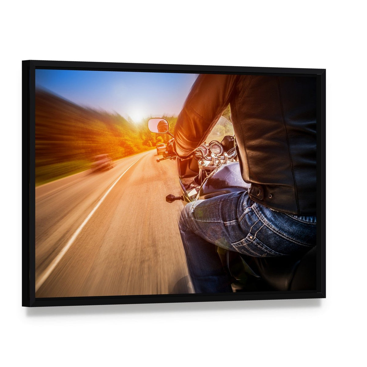 Biker Driving a Motorcycle Canvas Wall Art, framed canvas in a black floater frame, angled product view