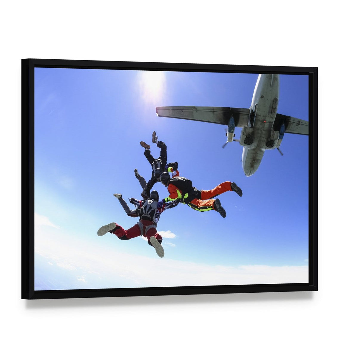 Exciting Skydiving Adventure with Airplane Canvas Wall Art, framed canvas in a black floater frame, angled product view