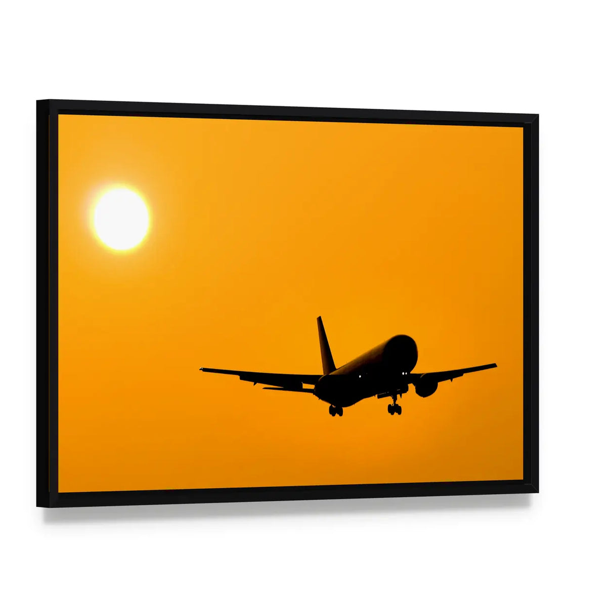Aircraft Landing At Sunset Canvas Wall Art, framed canvas in a black floater frame, angled product view