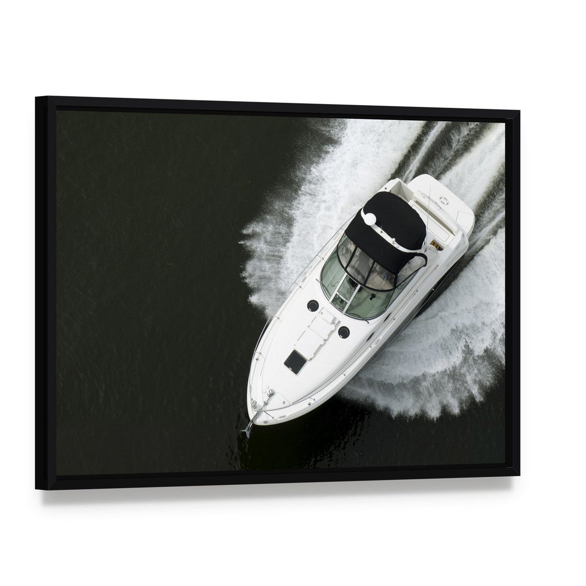 Aerial View of Speedboat Canvas Wall Art, framed canvas in a black floater frame, angled product view