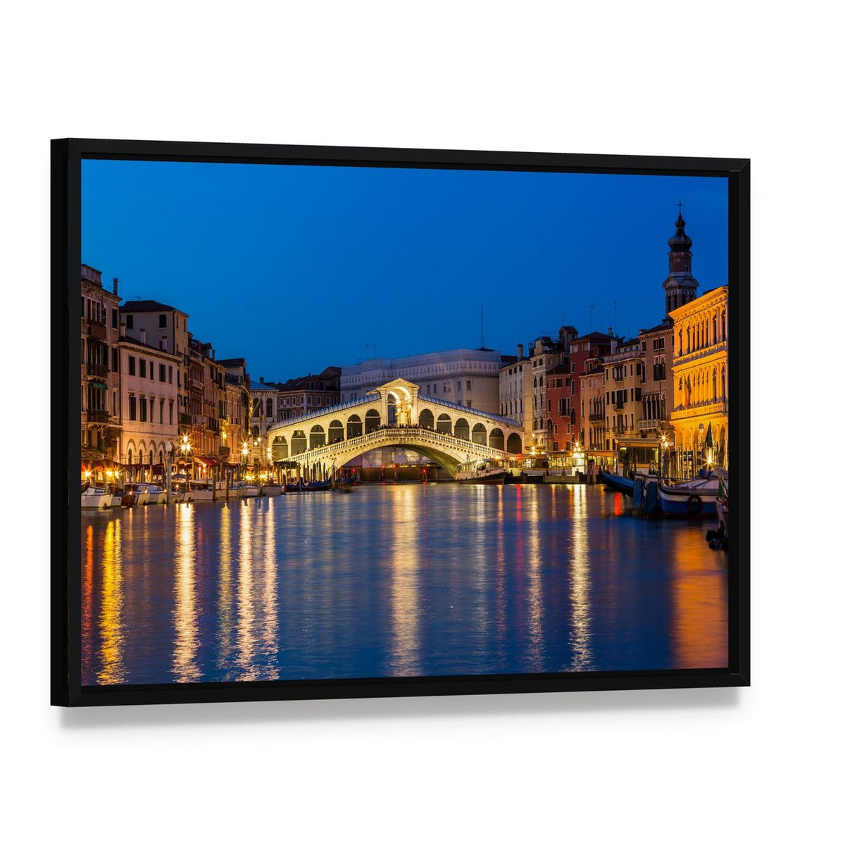 Rialto Bridge at Night Canvas Wall Art, framed canvas in a black floater frame, angled product view