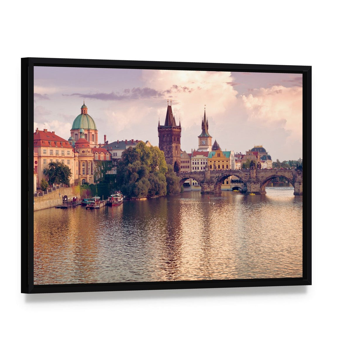 Prague Old Town River View Canvas Wall Art, framed canvas in a black floater frame, angled product view