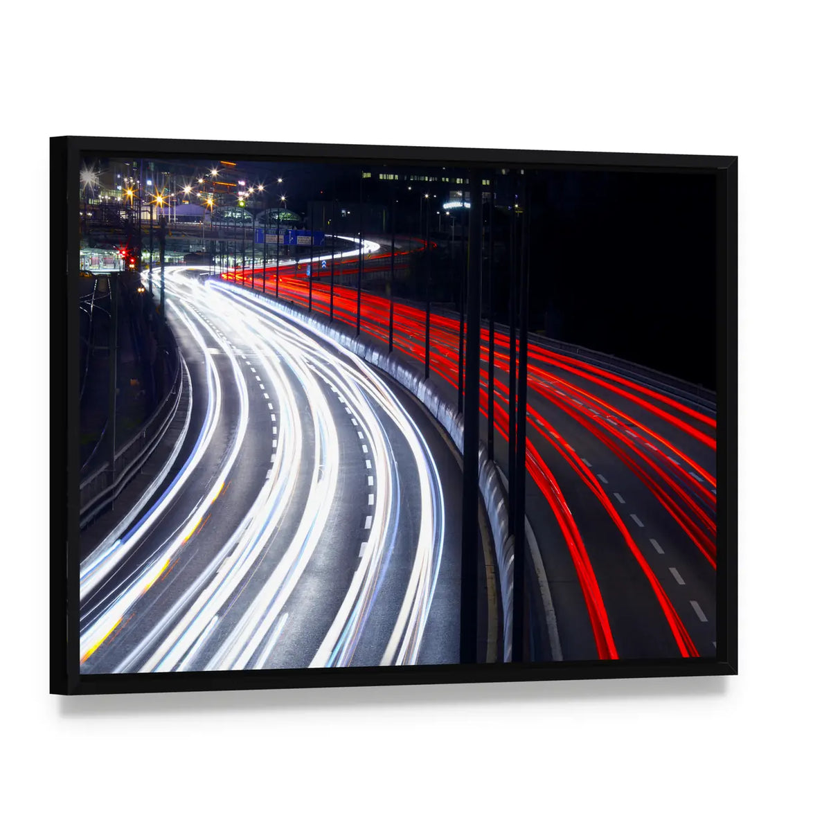 Light Trails From Cars In Stockholm Canvas Wall Art, framed canvas in a black floater frame, angled product view