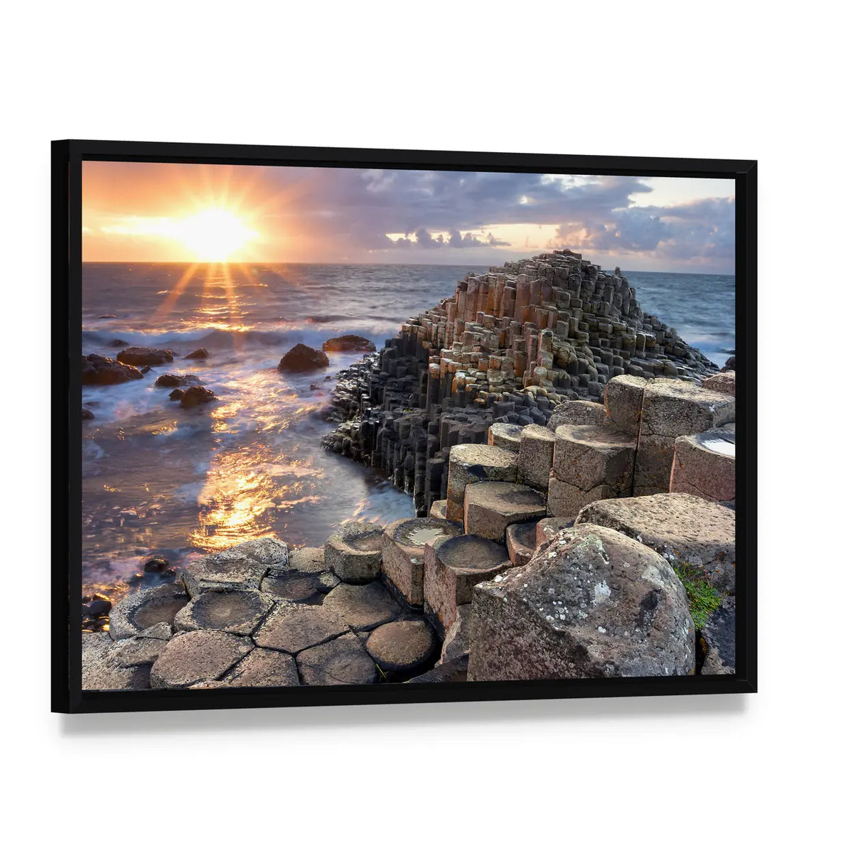 Giant's Causeway Sunset Over Basalt Columns Canvas Wall Art, framed canvas in a black floater frame, angled product view