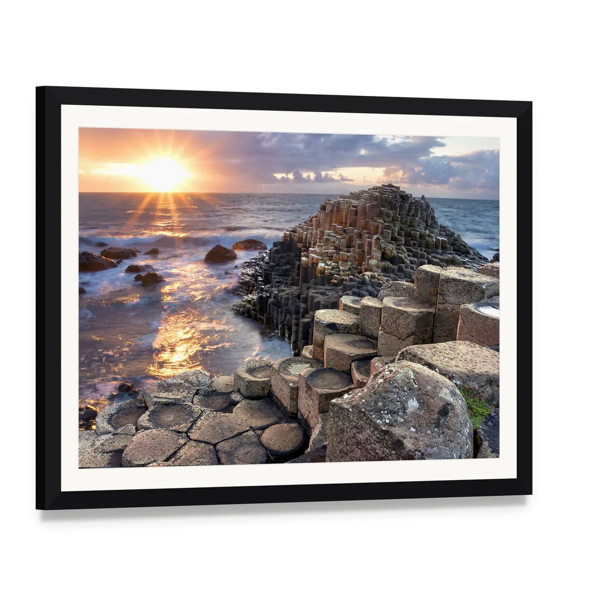 Giant's Causeway Sunset Over Basalt Columns Canvas Wall Art, framed print with white mat and black frame, angled product view