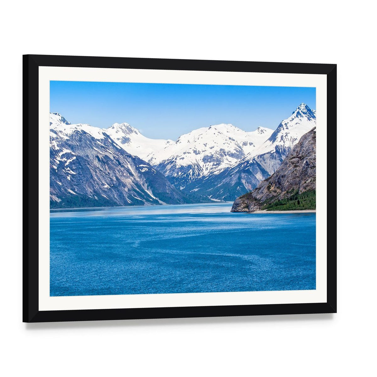 Snow-capped Mountains Over Calm Blue Water Canvas Wall Art, framed print with white mat and black frame, angled product view