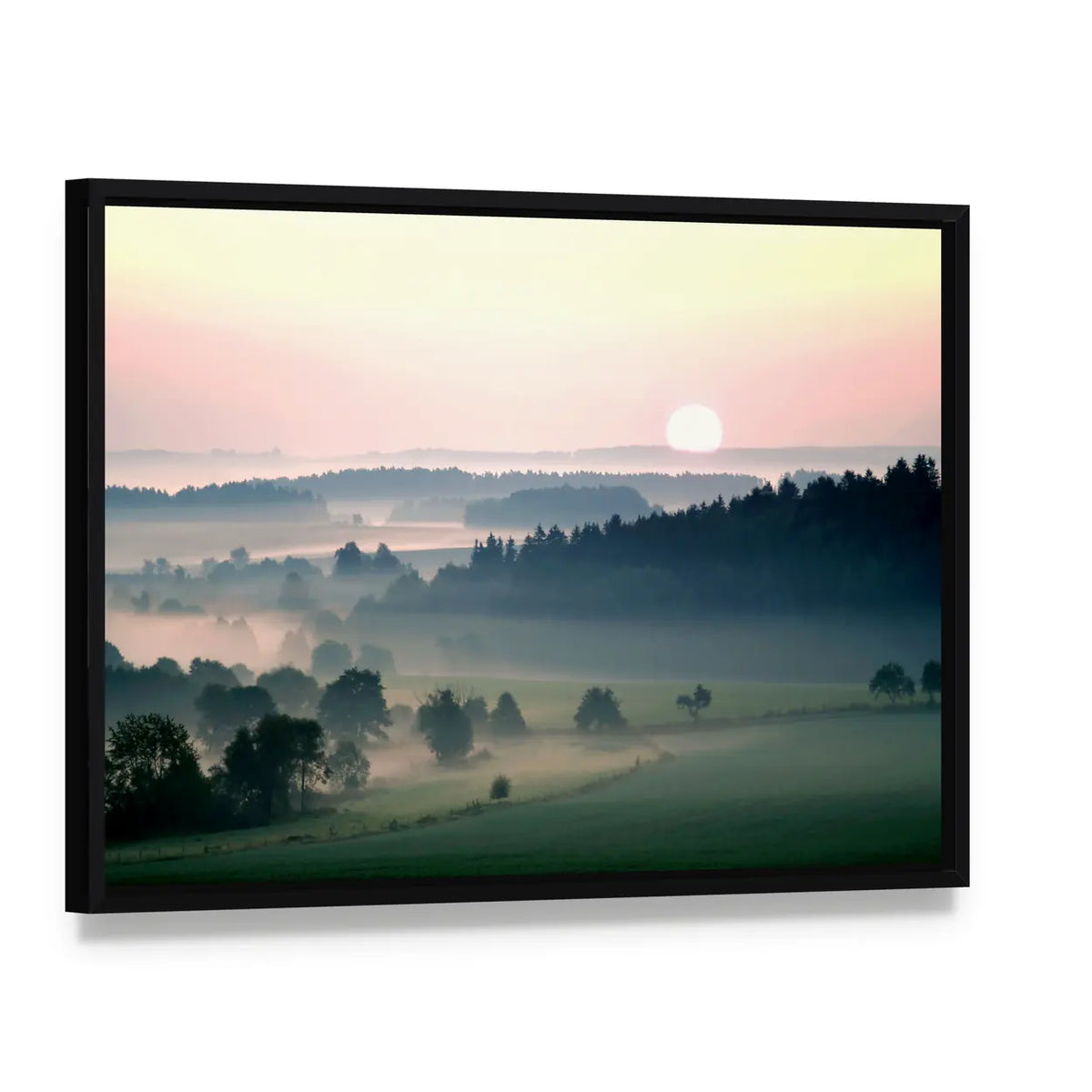 Misty Sunrise Over Layered Hills Canvas Wall Art, framed canvas in a black floater frame, angled product view