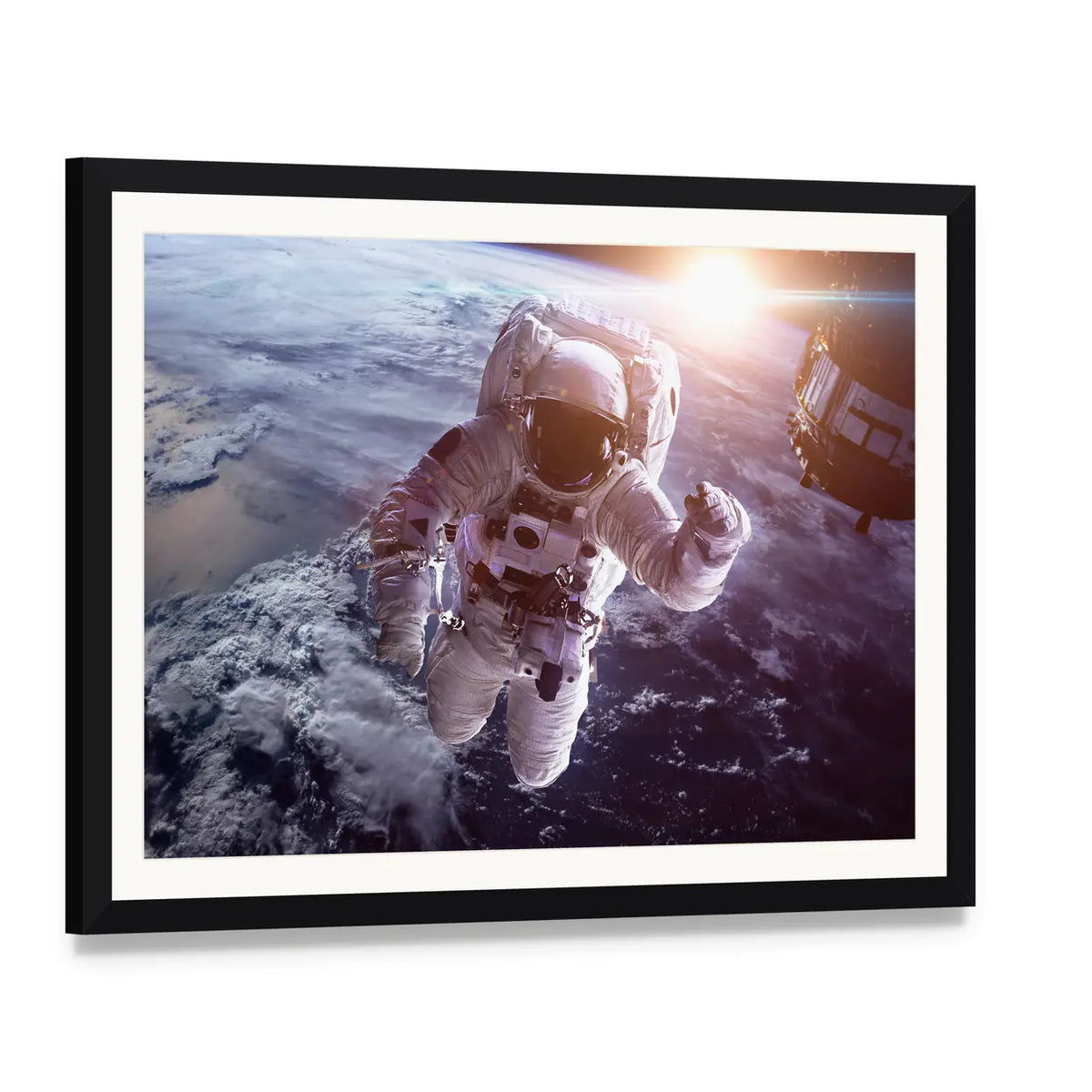 Astronaut Above the Earth Canvas Wall Art, framed print with white mat and black frame, angled product view