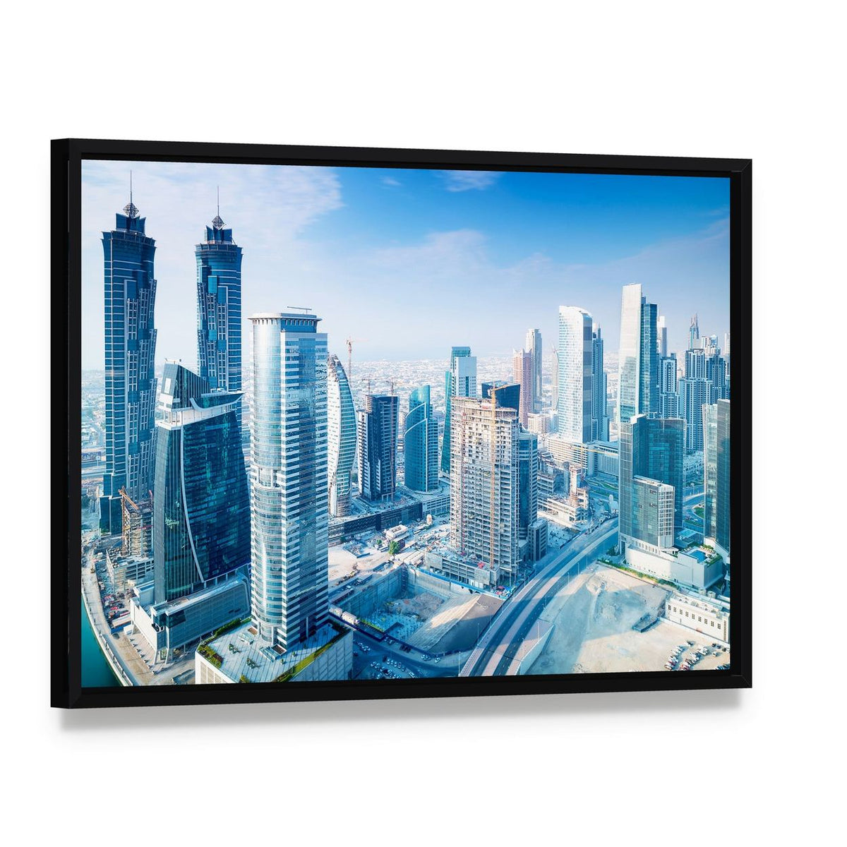 Dubai City Canvas Wall Art, framed canvas in a black floater frame, angled product view