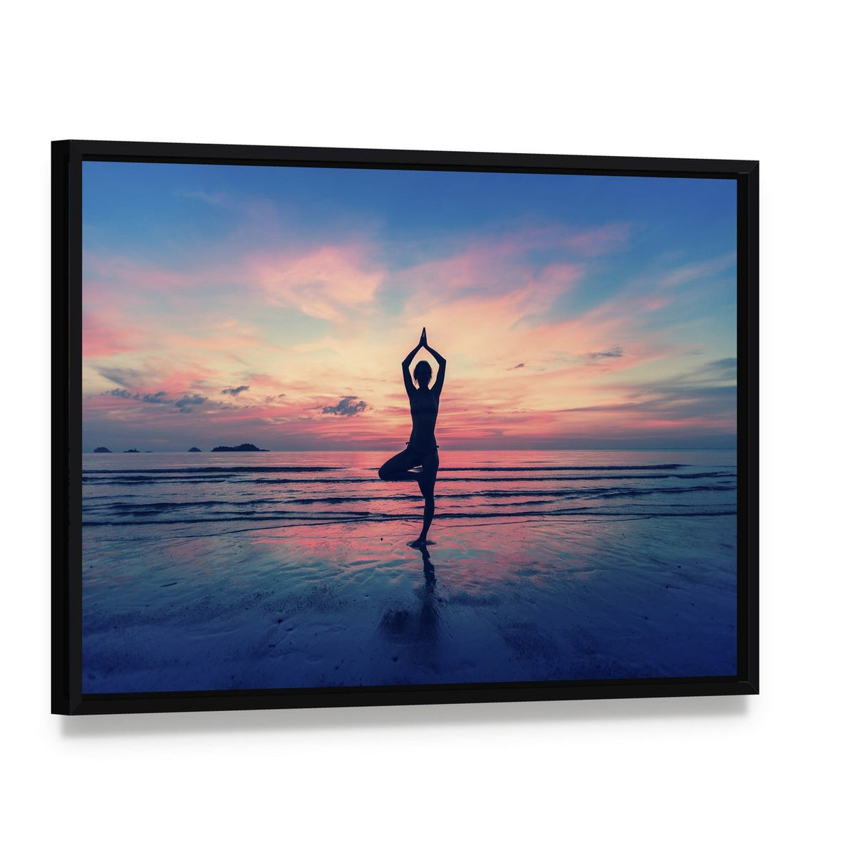 Silhouette of Woman in Yoga Pose at Sunset Canvas Wall Art, framed canvas in a black floater frame, angled product view