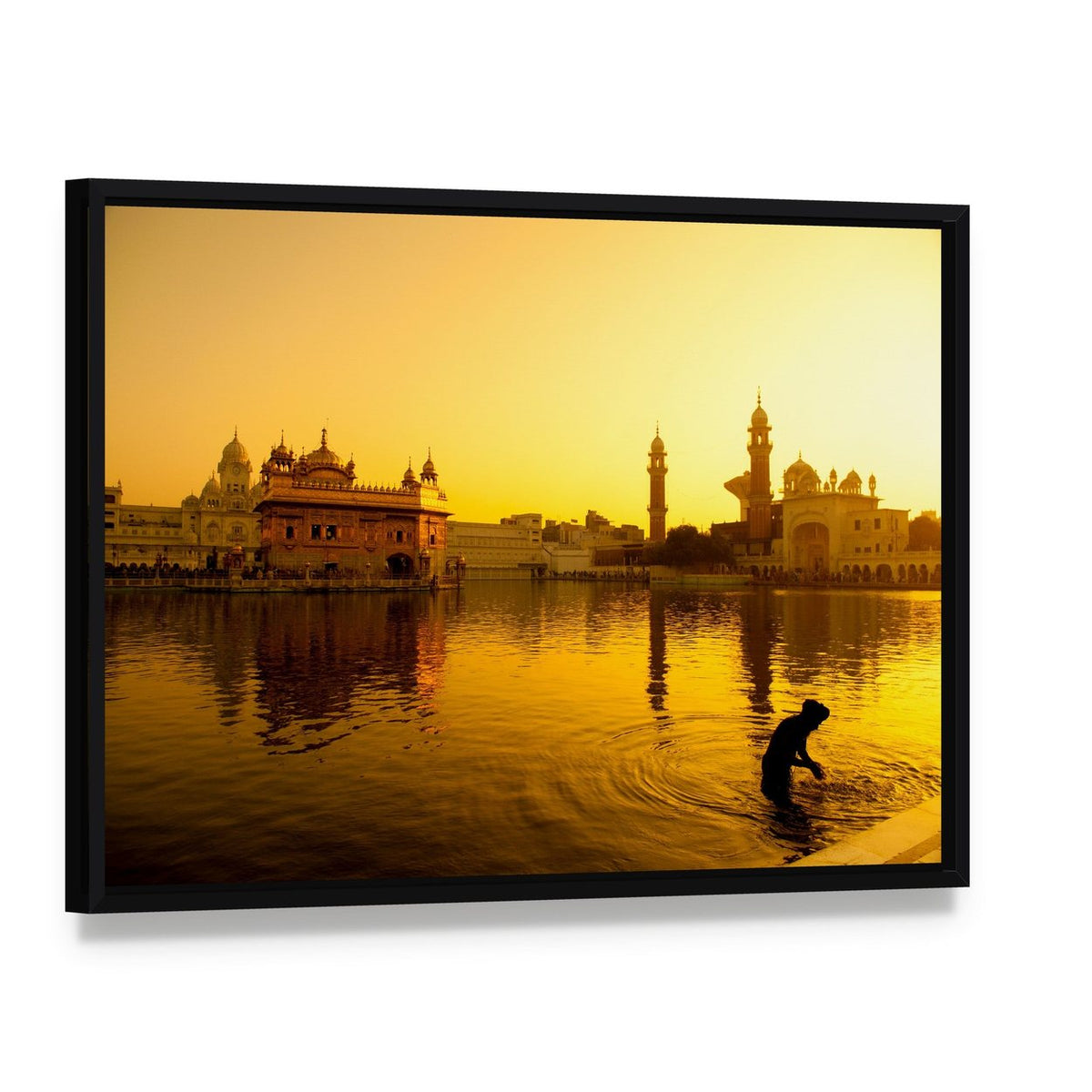 Sunset at Golden Temple in India Canvas Wall Art, framed canvas in a black floater frame, angled product view