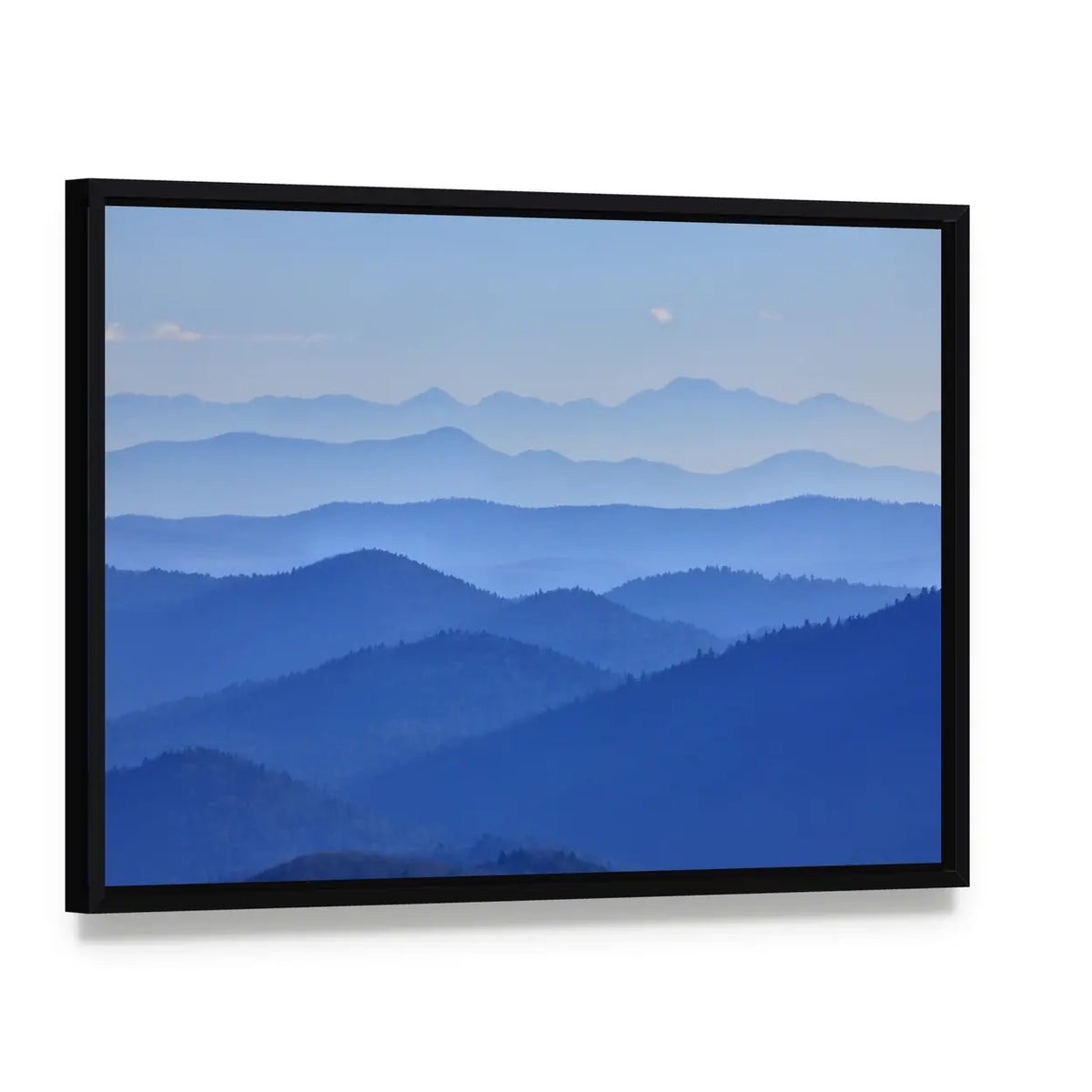 Misty Mountain Valley with Moon Canvas Wall Art, framed canvas in a black floater frame, angled product view