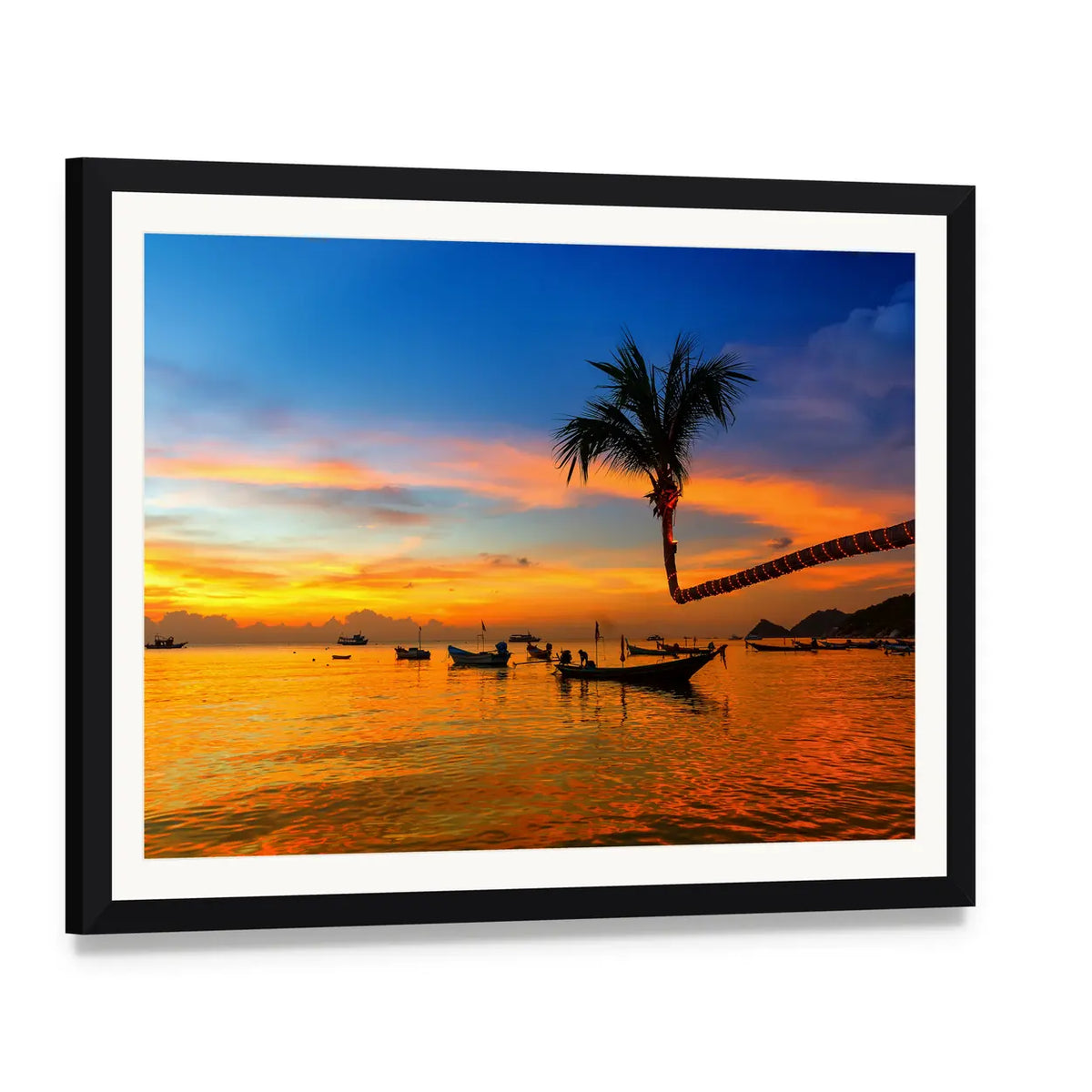 Sunset Beach with Leaning Palm and Boats Canvas Wall Art, framed print with white mat and black frame, angled product view