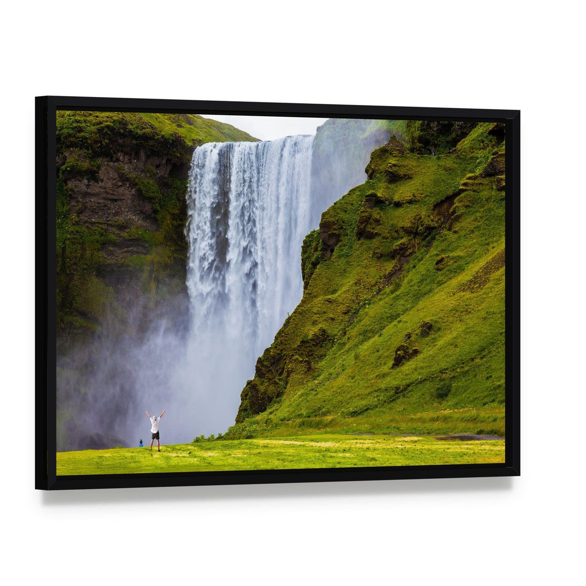 Grand Waterfall Iceland Canvas Wall Art, framed canvas in a black floater frame, angled product view