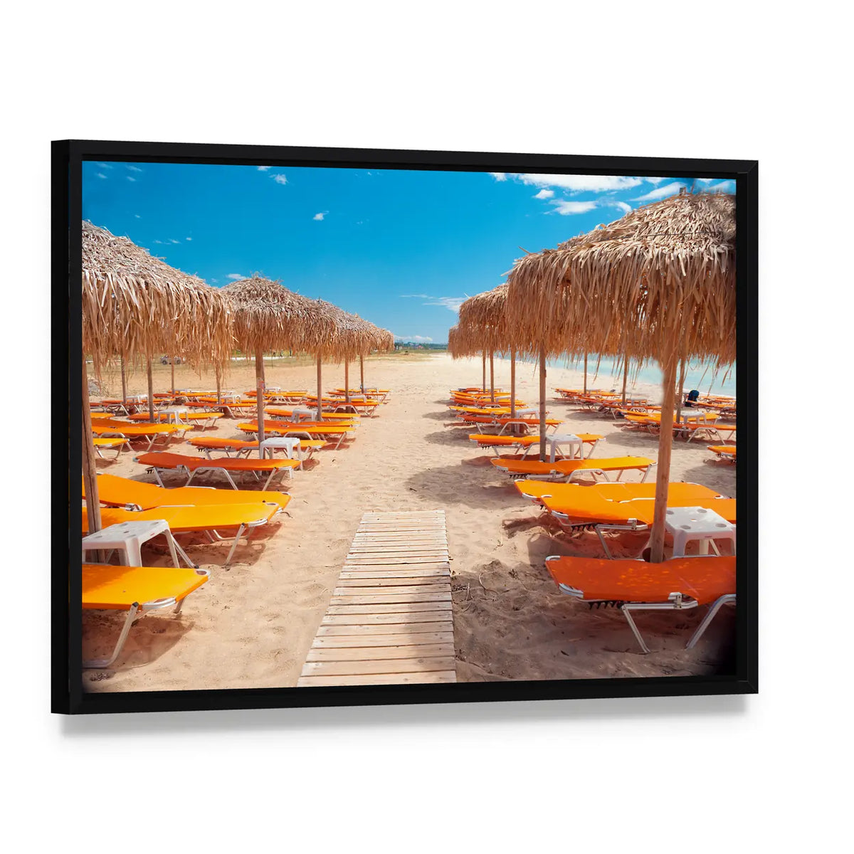 Greek Beach with Wooden Walkway and Orange Loungers Canvas Wall Art, framed canvas in a black floater frame, angled product view