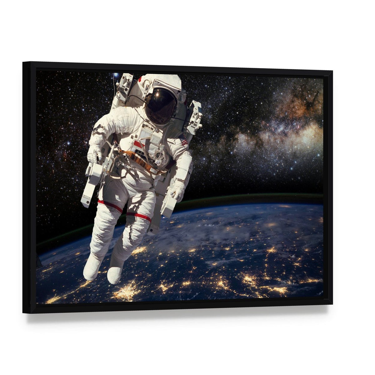 Astronaut and Milky Way Canvas Wall Art, framed canvas in a black floater frame, angled product view
