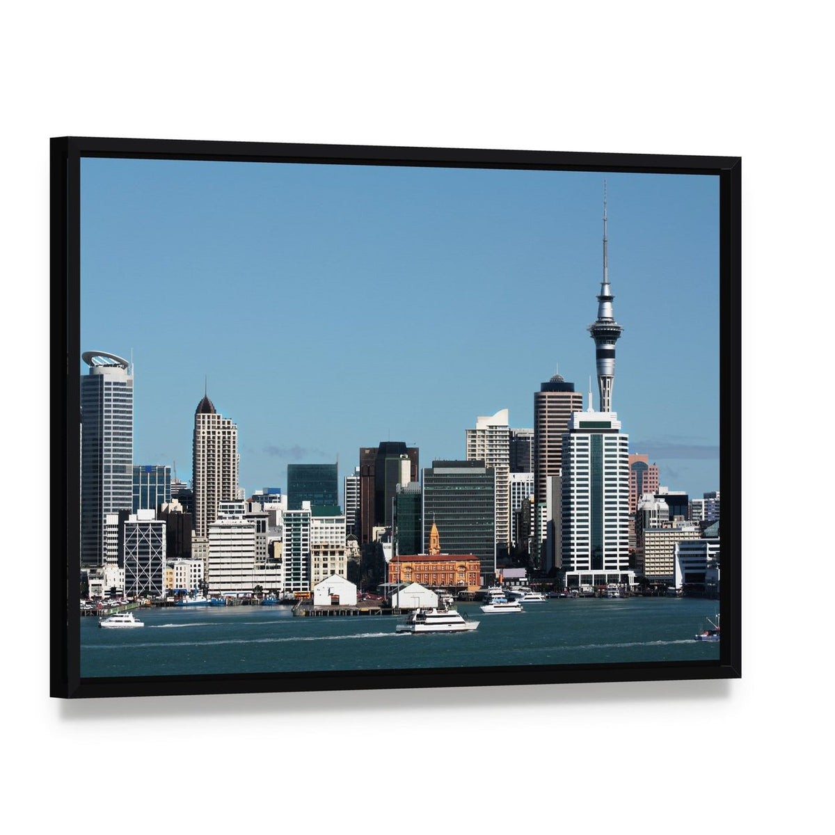 City Skyline with Sky Tower Canvas Wall Art, framed canvas in a black floater frame, angled product view