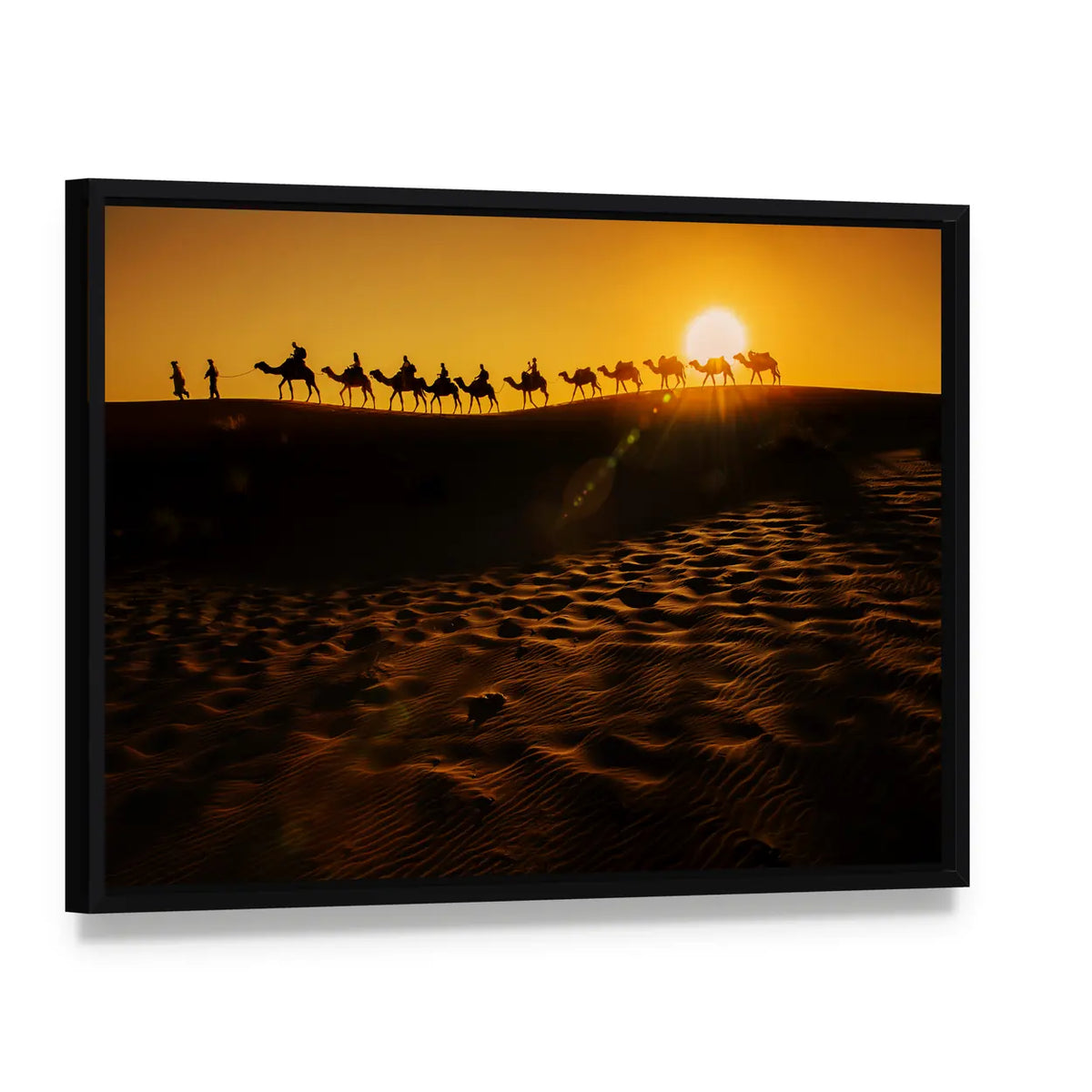 Camel Caravan at Sunset Canvas Wall Art, framed canvas in a black floater frame, angled product view