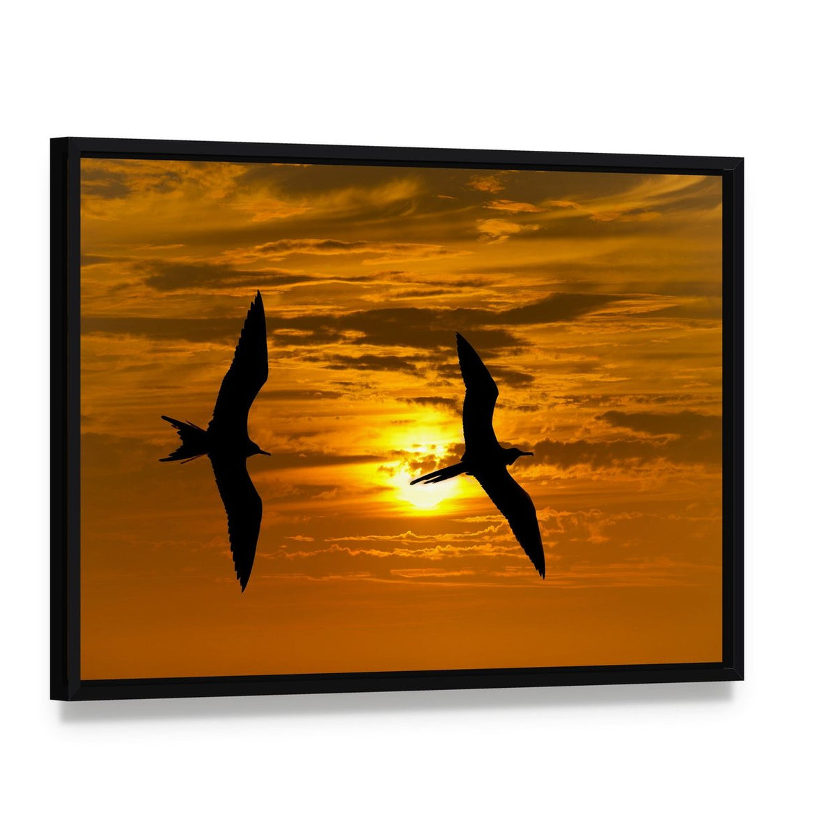 Two Birds Flying Silhouette at Sunset Canvas Wall Art, framed canvas in a black floater frame, angled product view